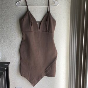 Beige asymmetrical dress.